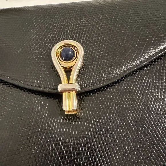 Gucci Black and Gold Leather Clutch